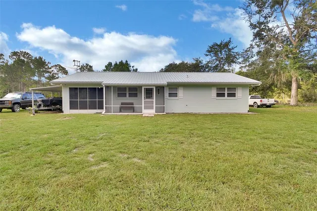 $449,000 | 22040 Blue Creek Lodge Road, Astor, FL 32102