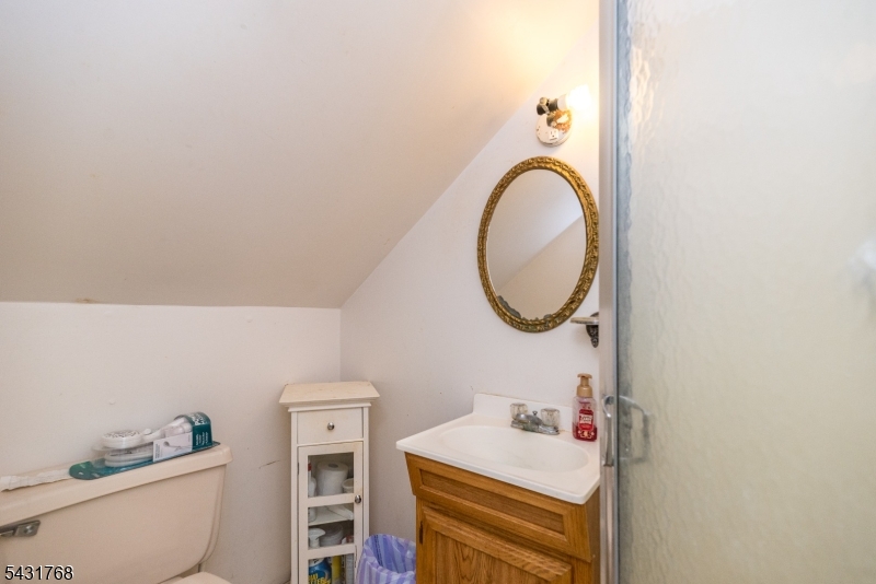 400 Mechlin Corner Road Pittstown, NJ 08867 - Photo 21 of 29 a bathroom with a sink vanity mirror and toilet