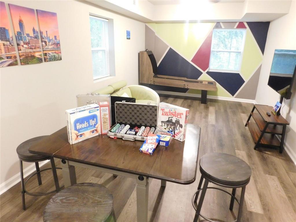 507 Pineridge Road Forest Park, GA 30297 - Photo 6 of 14 a view of a dining room with furniture and wooden floor