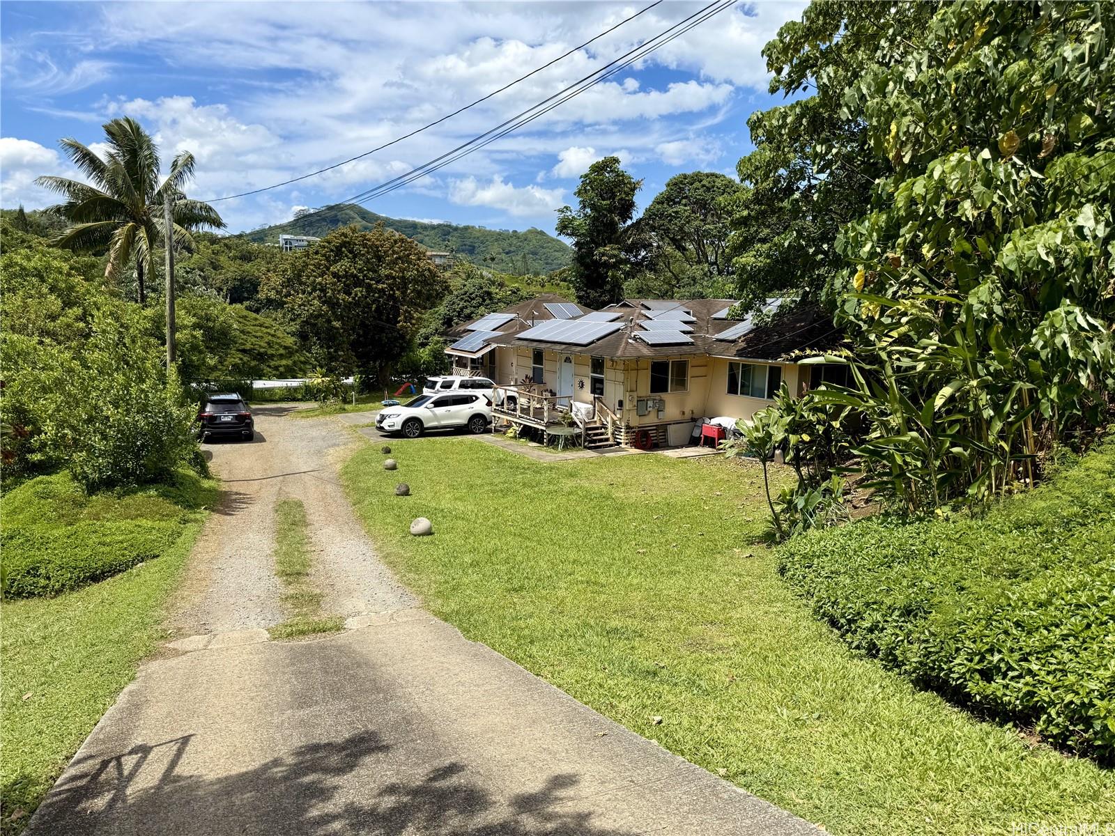 47-351 Waihee Road Kaneohe, HI 96744 - Photo 3 of 7 a view of yard with swimming pool and green space