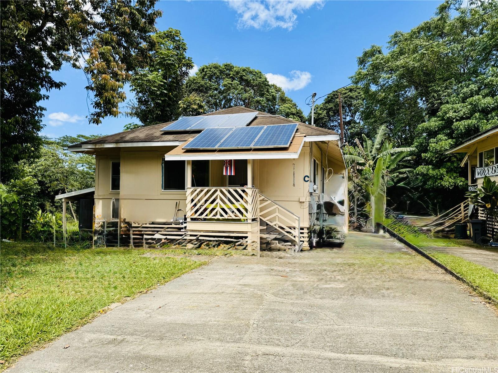 47-351 Waihee Road Kaneohe, HI 96744 - Photo 5 of 7 a front view of a house with a yard