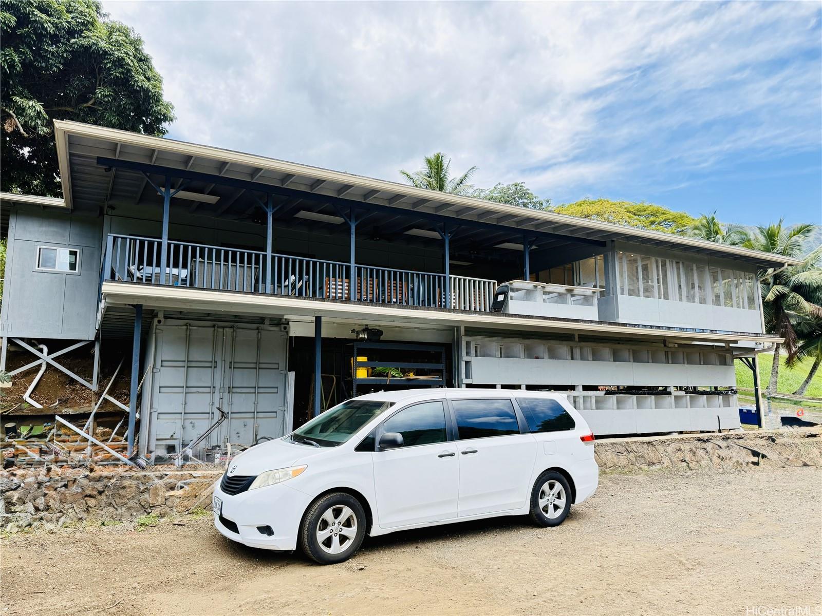 47-351 Waihee Road Kaneohe, HI 96744 - Photo 6 of 7 a car parked in front of a house