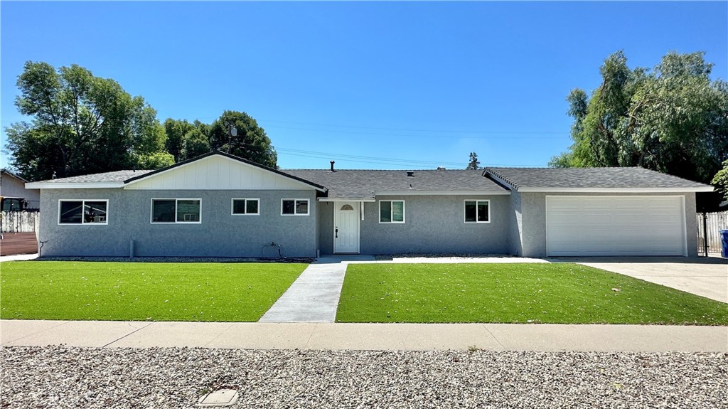 4068 Deborah Street Simi Valley, CA 93063 - Photo 1 of 1 a front view of a house with a yard