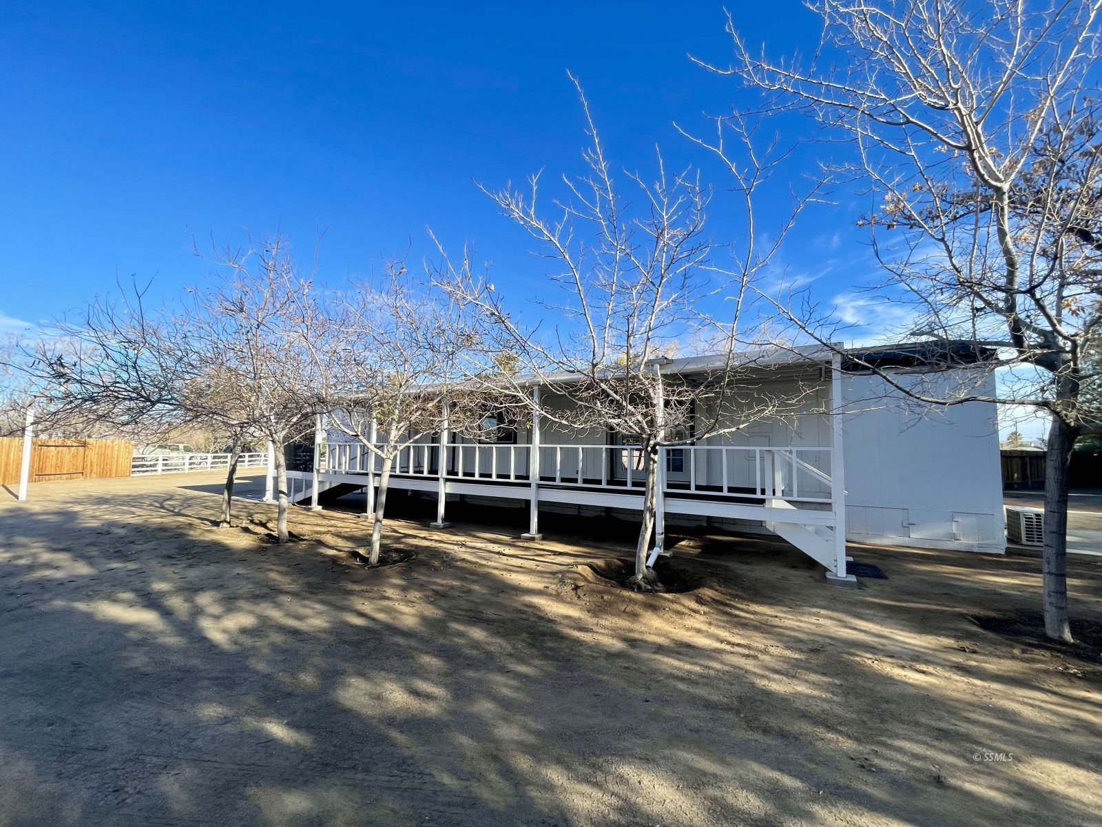 1449 Dunes Street Ridgecrest, CA 93555 - Photo 46 of 50 a view of a house with a yard and sitting area