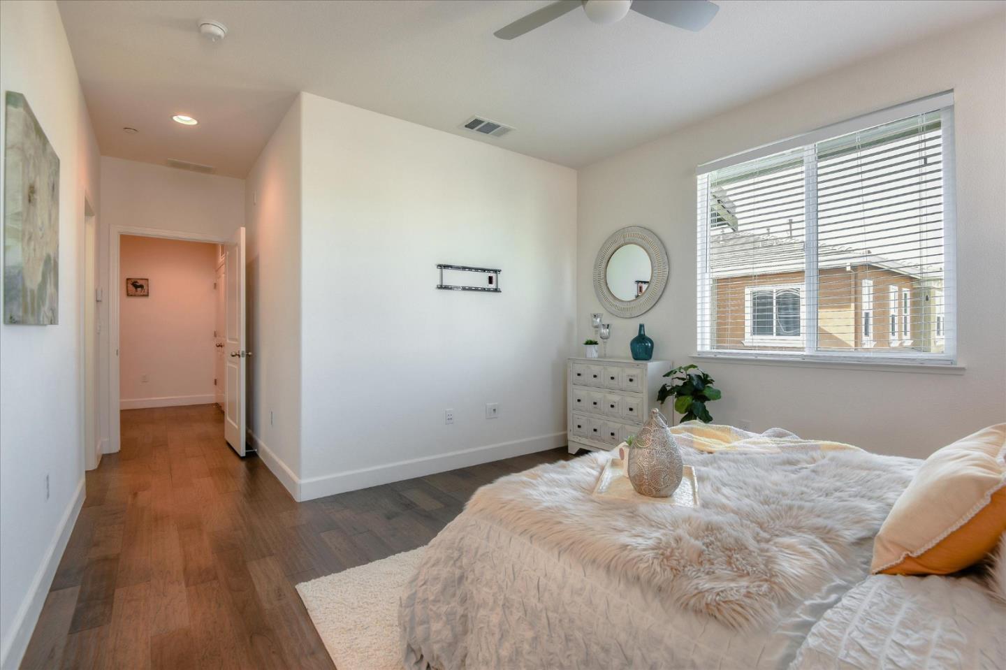 1915 McCandless Drive Milpitas, CA 95035 - Photo 20 of 28 a bedroom with a bed and a window