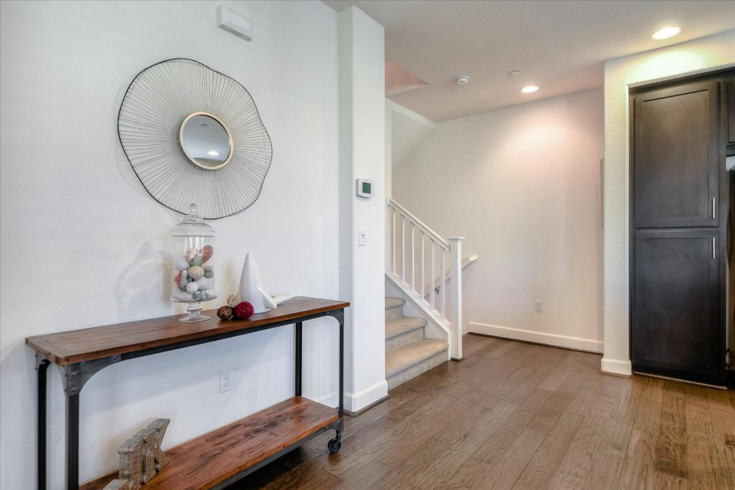 1915 McCandless Drive Milpitas, CA 95035 - Photo 25 of 28 an entryway with wooden floor and windows