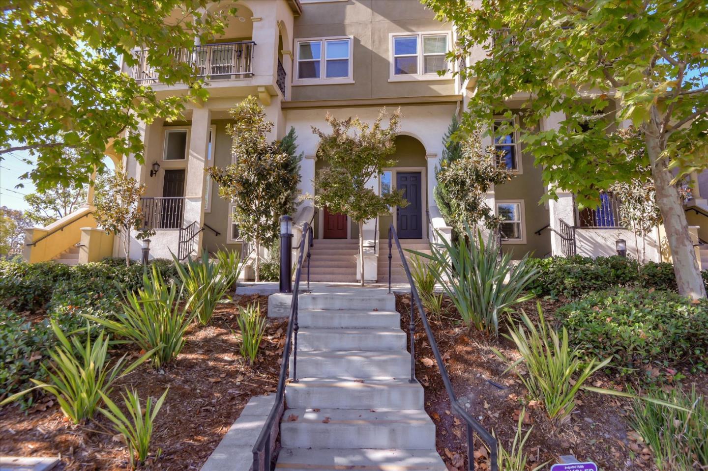 1915 McCandless Drive Milpitas, CA 95035 - Photo 26 of 28 a front view of a multi story building with yard
