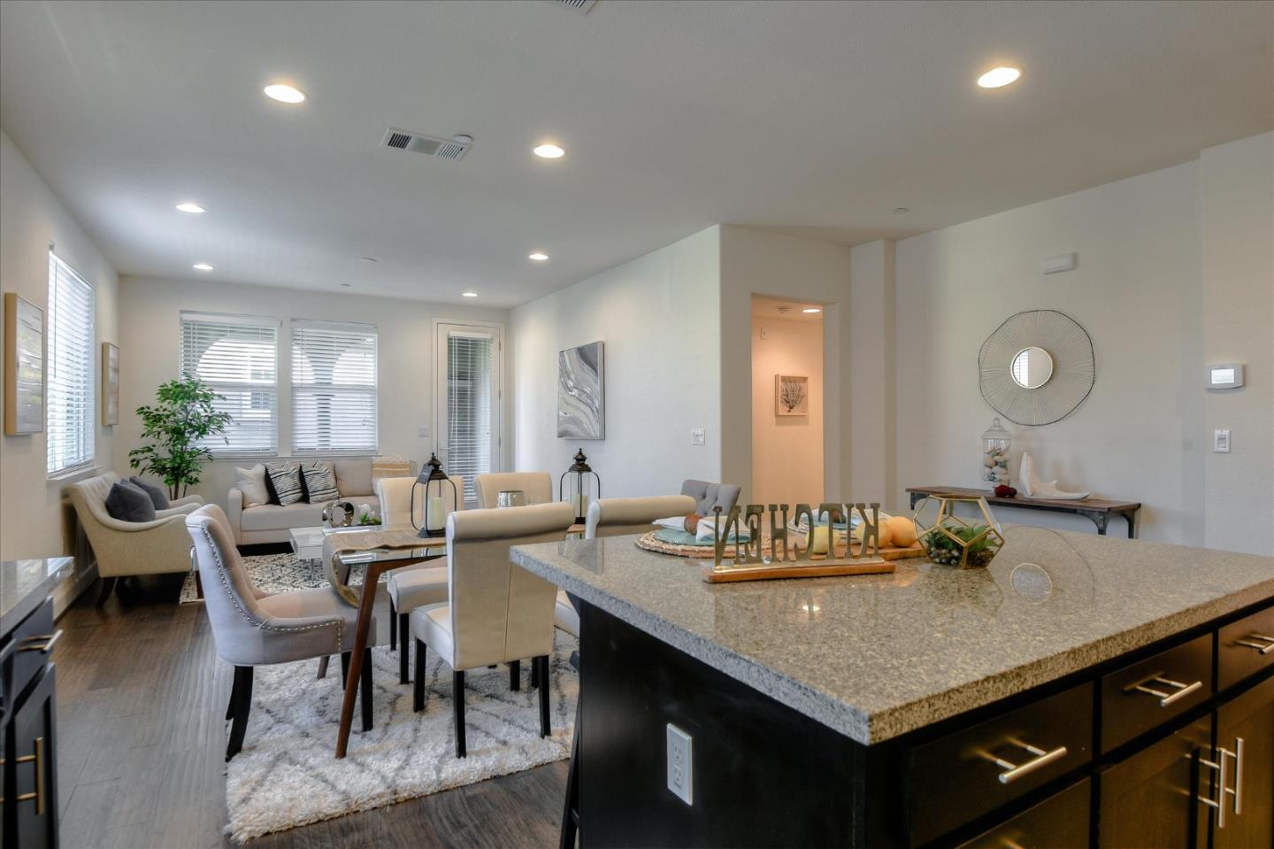 1915 McCandless Drive Milpitas, CA 95035 - Photo 3 of 28 a view of a a dining room with furniture window and wooden floor