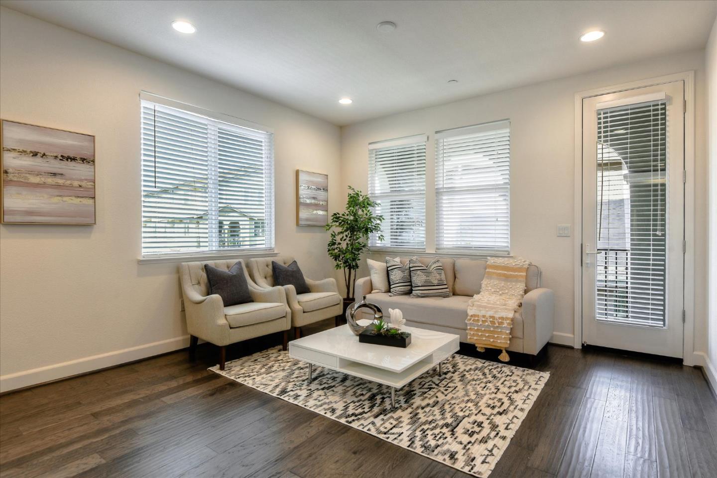 1915 McCandless Drive Milpitas, CA 95035 - Photo 4 of 28 a living room with furniture and wooden floor