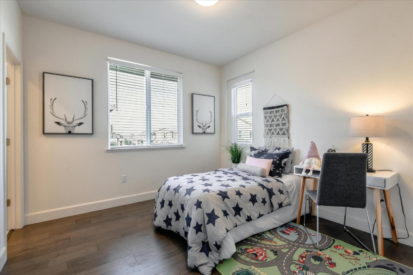 1915 McCandless Drive Milpitas, CA 95035 - Photo 8 of 28 a bedroom with a bed and wooden floor