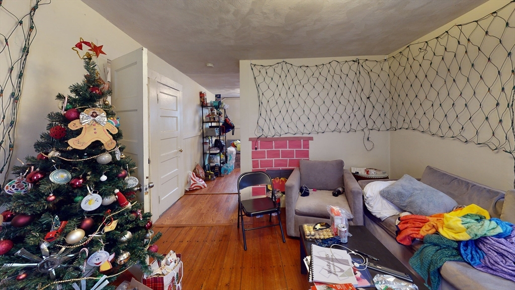 9 R Winship Street, Unit A Boston, MA 02135 - Photo 4 of 10 a living room with furniture and flowers