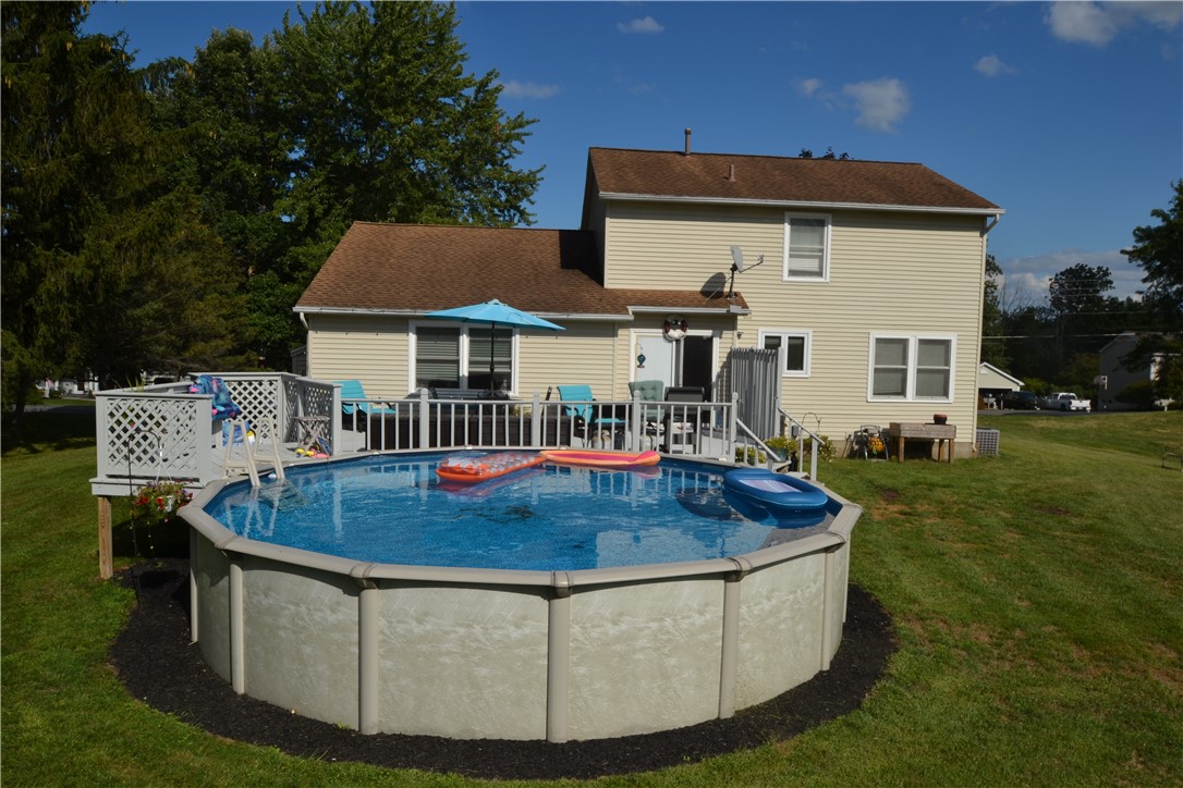 3479 West Walworth Road Walworth, NY 14502 - Photo 39 of 41 2023 Pool & rear of house - summer