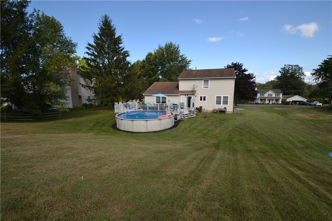 3479 West Walworth Road Walworth, NY 14502 - Photo 40 of 41 2023 Pool & rear of house - summer