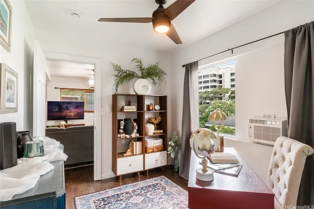 a living room with furniture and a window