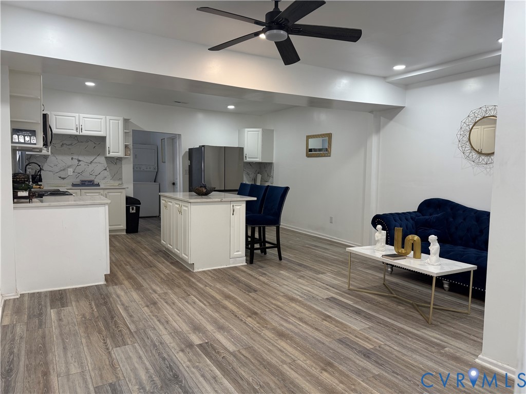 1340 Rome Street Petersburg, VA 23803 - Photo 20 of 35 a living room with furniture and a wooden floor