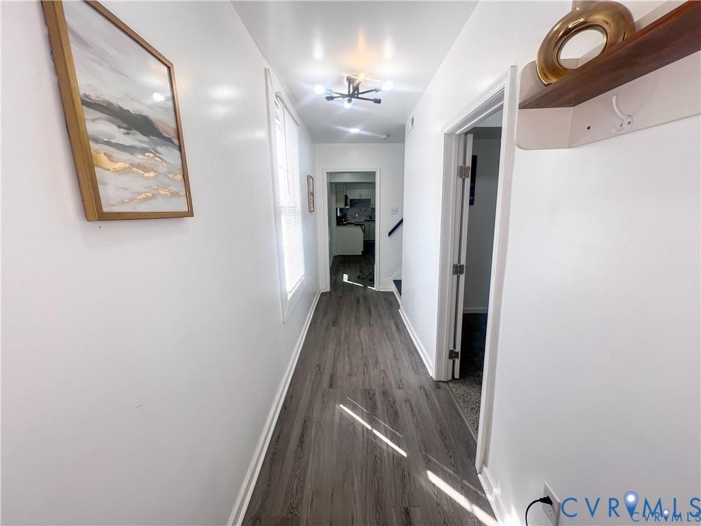 1340 Rome Street Petersburg, VA 23803 - Photo 2 of 35 a view of a hallway view with wooden floor and staircase