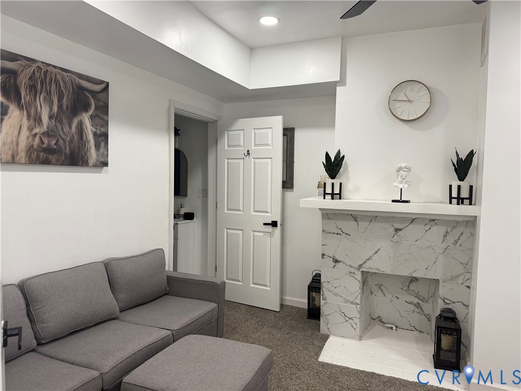 1340 Rome Street Petersburg, VA 23803 - Photo 3 of 35 a living room with furniture and a fireplace