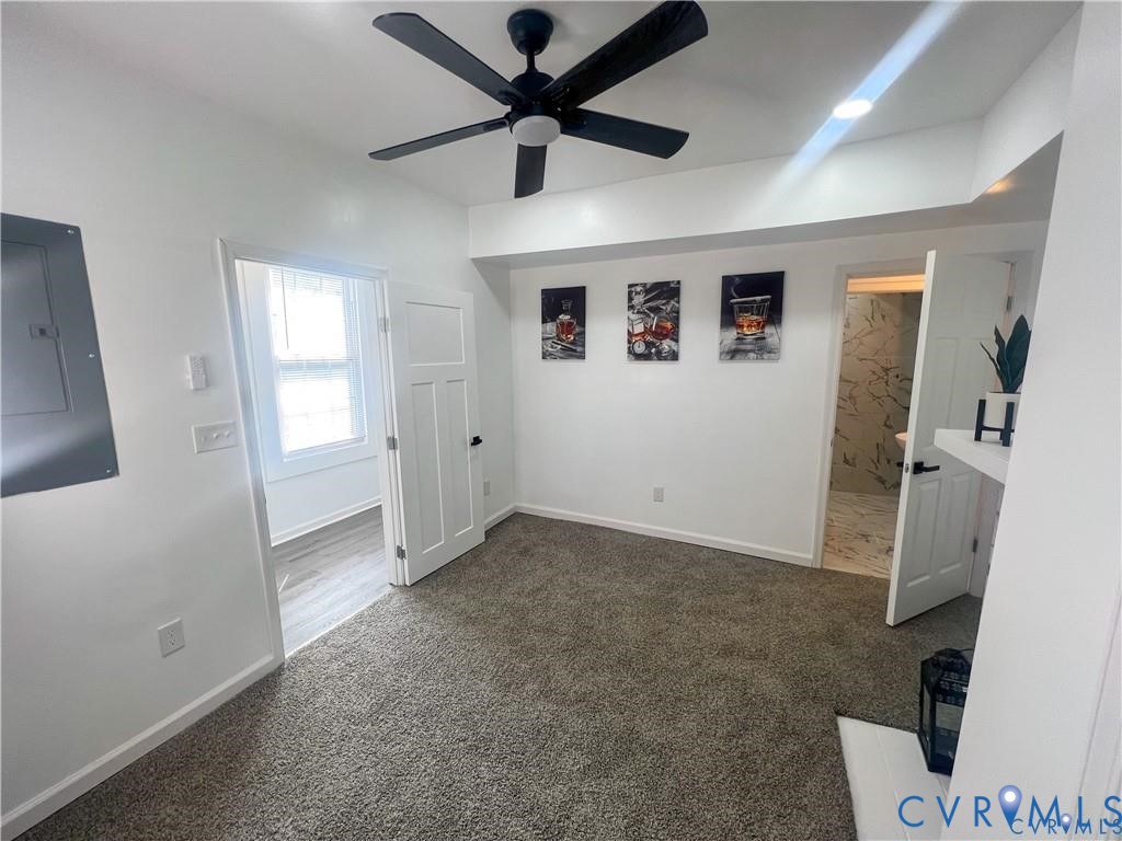 1340 Rome Street Petersburg, VA 23803 - Photo 6 of 35 a view of a livingroom with a ceiling fan and window