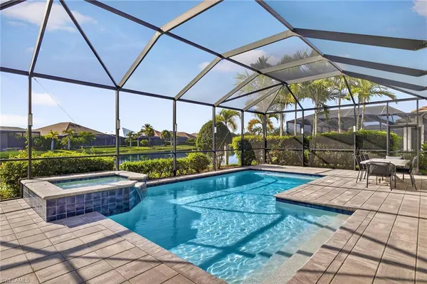 a view of a swimming pool with a porch