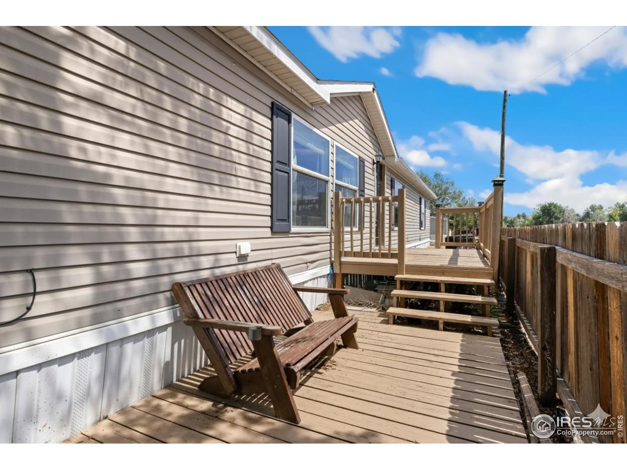 218 Grape Street, Unit 29 Hudson, CO 80642 - Photo 19 of 26 a view of outdoor space with seating space