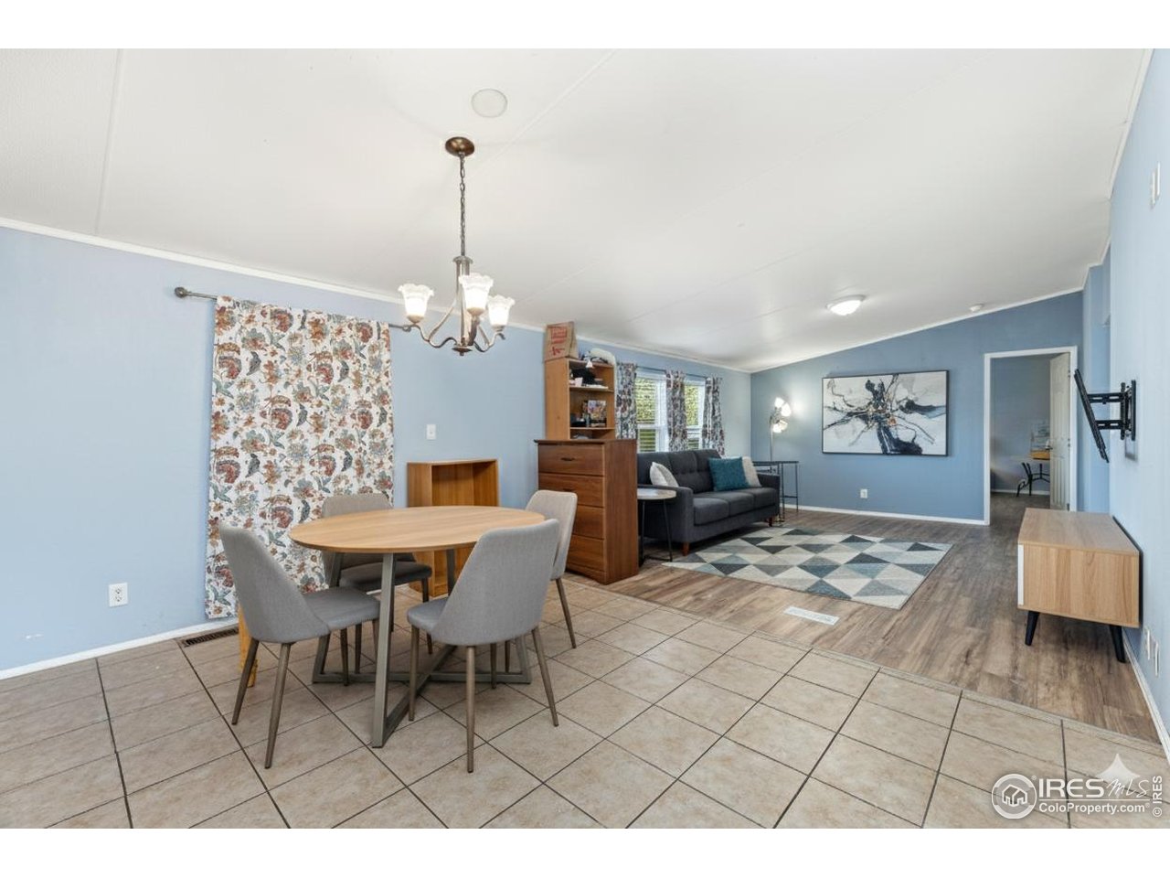 218 Grape Street, Unit 29 Hudson, CO 80642 - Photo 24 of 26 a view of a dining room with furniture