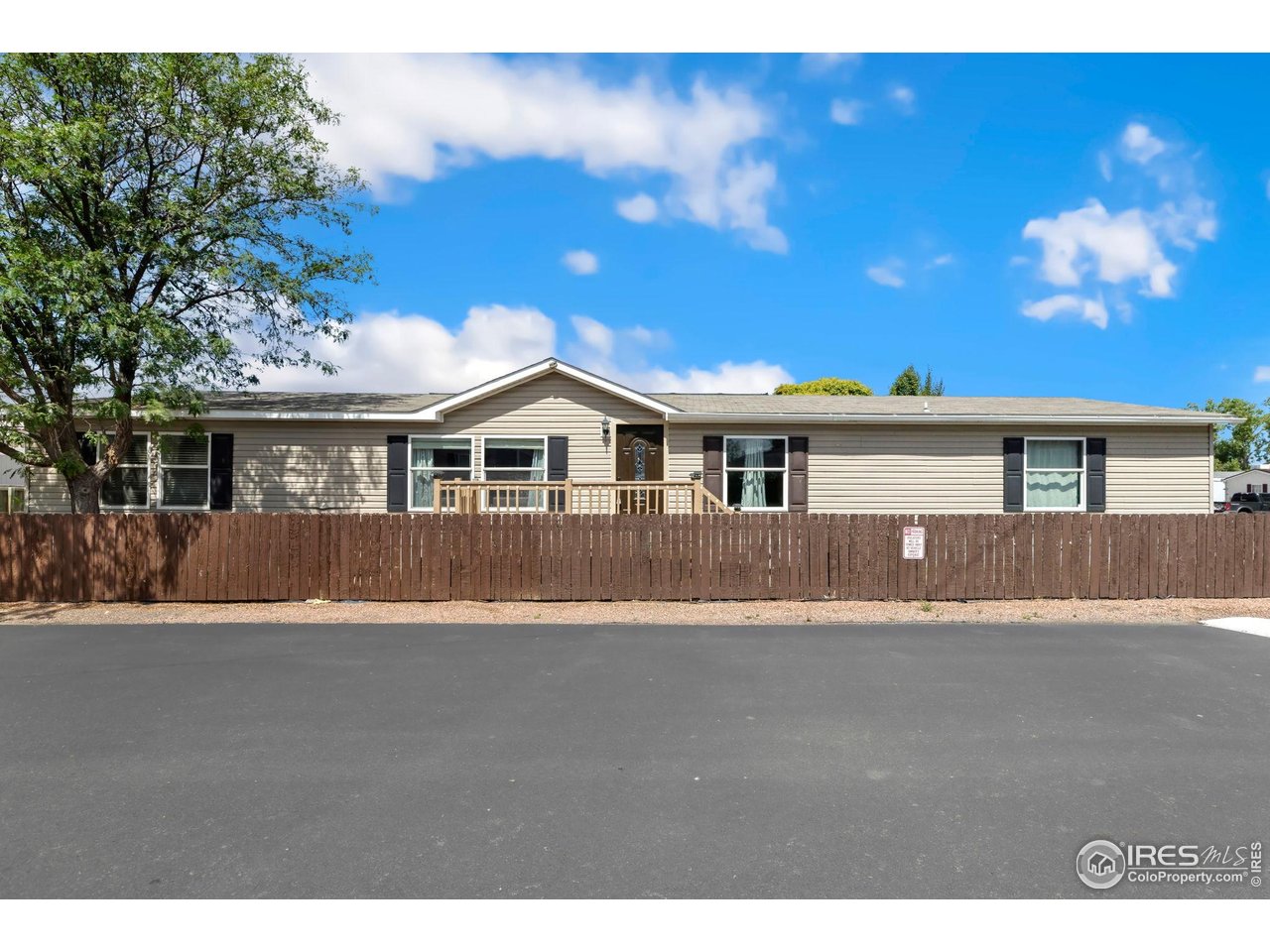 218 Grape Street, Unit 29 Hudson, CO 80642 - Photo 5 of 26 a view of house with yard