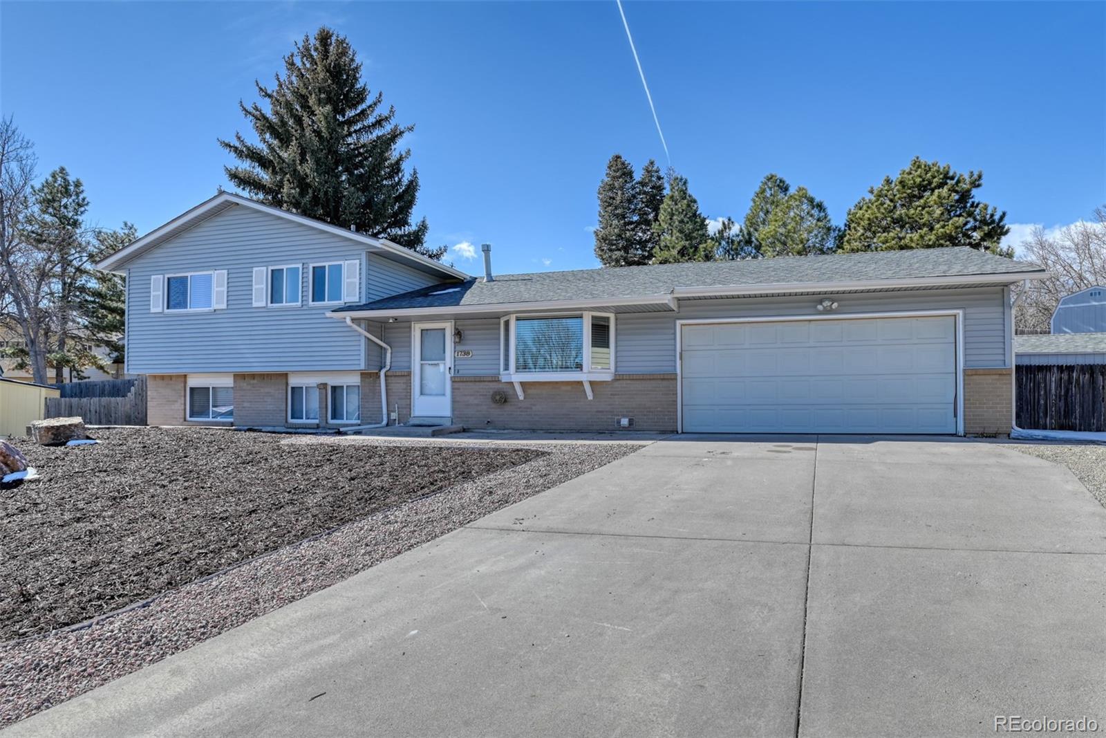 1738 Wooten Road Colorado Springs, CO 80915 - Photo 3 of 47