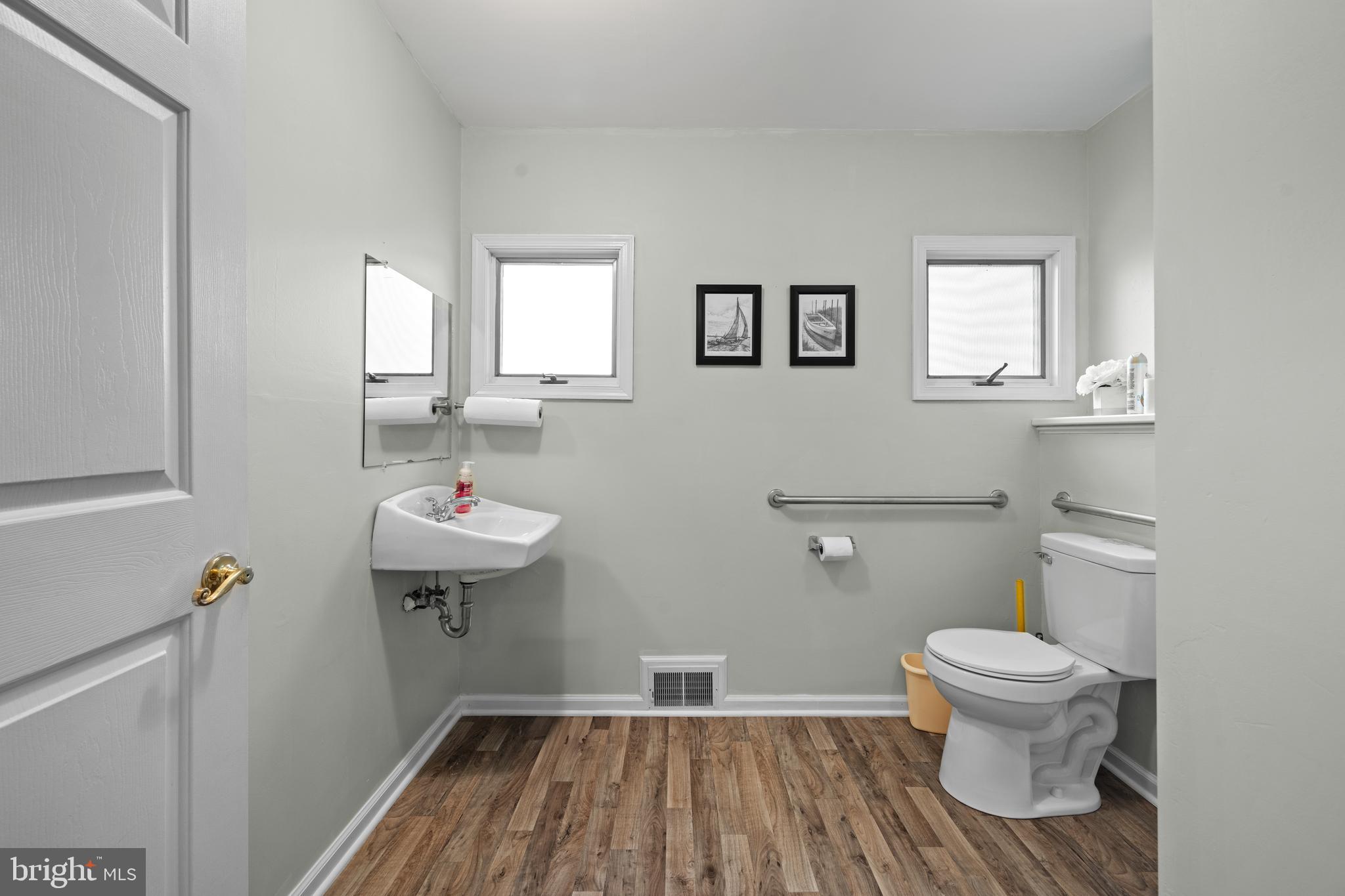 643 Main Street Leesburg, NJ 08327 - Photo 17 of 30 a bathroom with a toilet and a sink