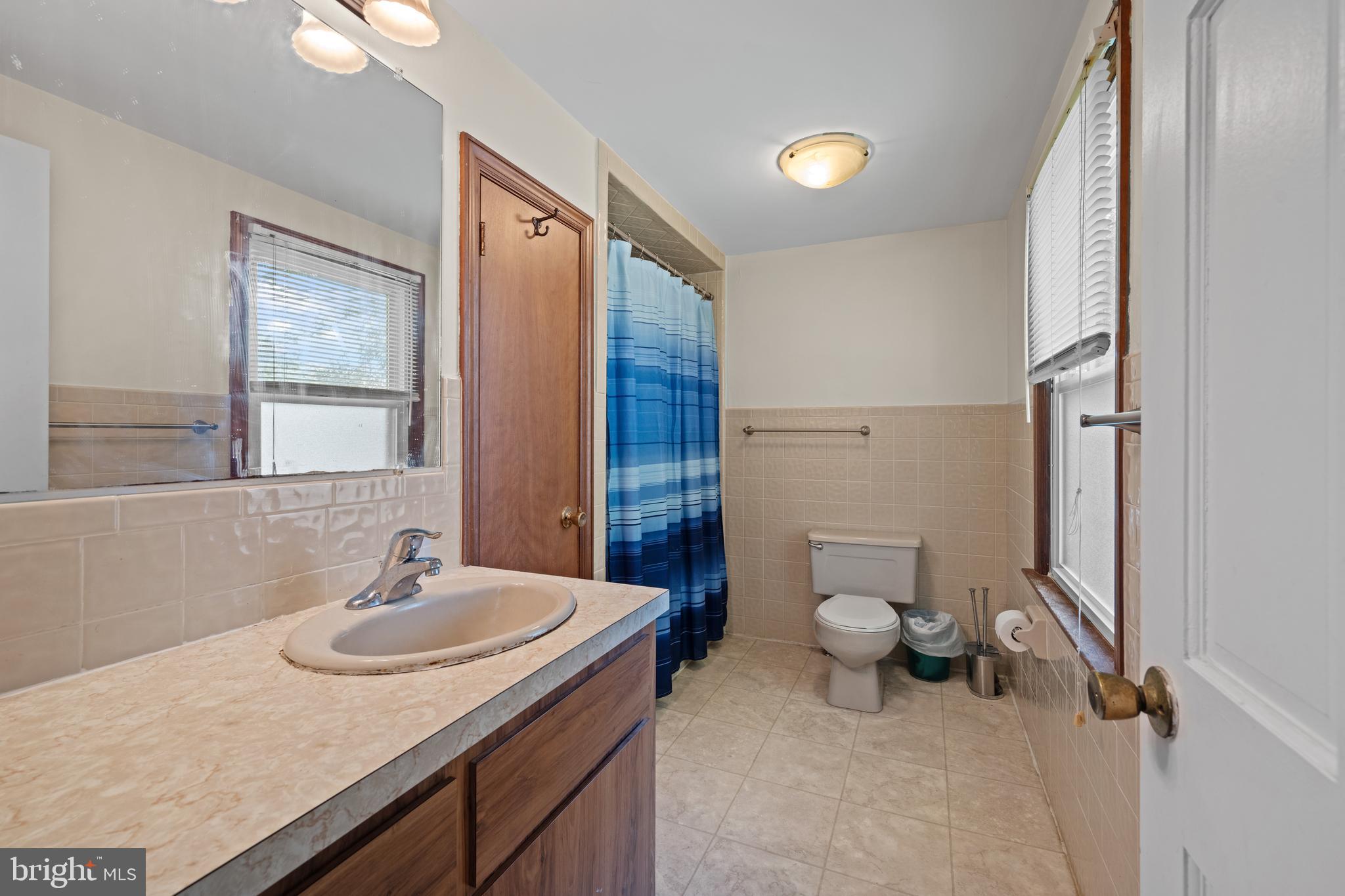 643 Main Street Leesburg, NJ 08327 - Photo 22 of 30 a bathroom with a sink and a toilet