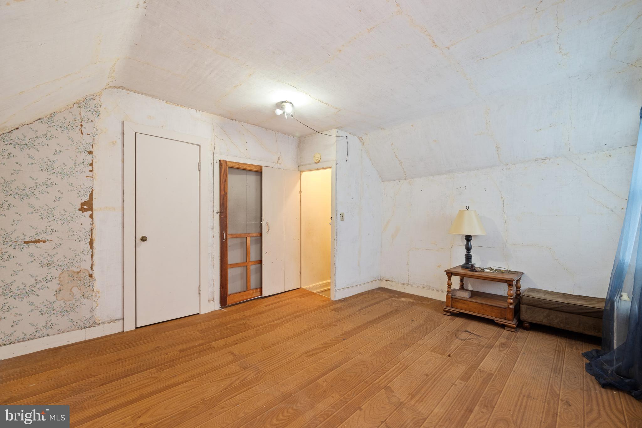 643 Main Street Leesburg, NJ 08327 - Photo 30 of 30 a bedroom with a bed and a window