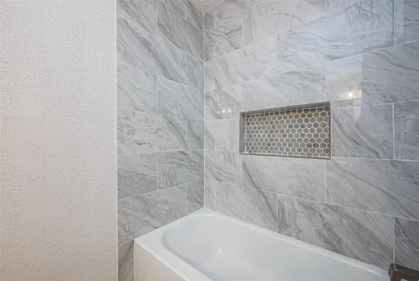 a bathroom with a bathtub