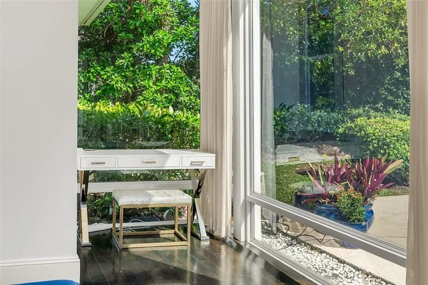 a view of room with furniture and garden view