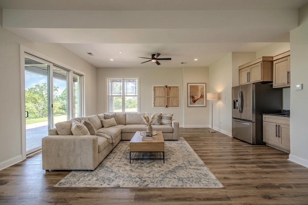 851 Rivers Edge Drive Bath Springs, TN 38311 - Photo 3 of 39 Open-concept living space featuring wood-finish flooring, recessed lighting, and a ceiling fan