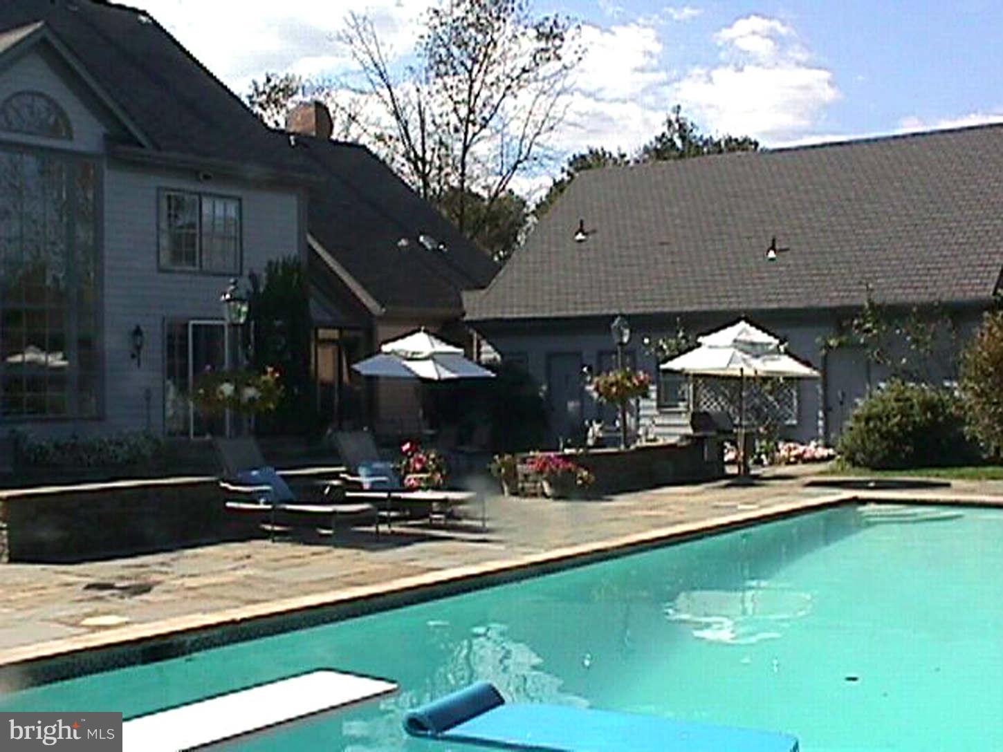 9311 River Road Potomac, MD 20854 - Photo 3 of 29 Rear patio & pool