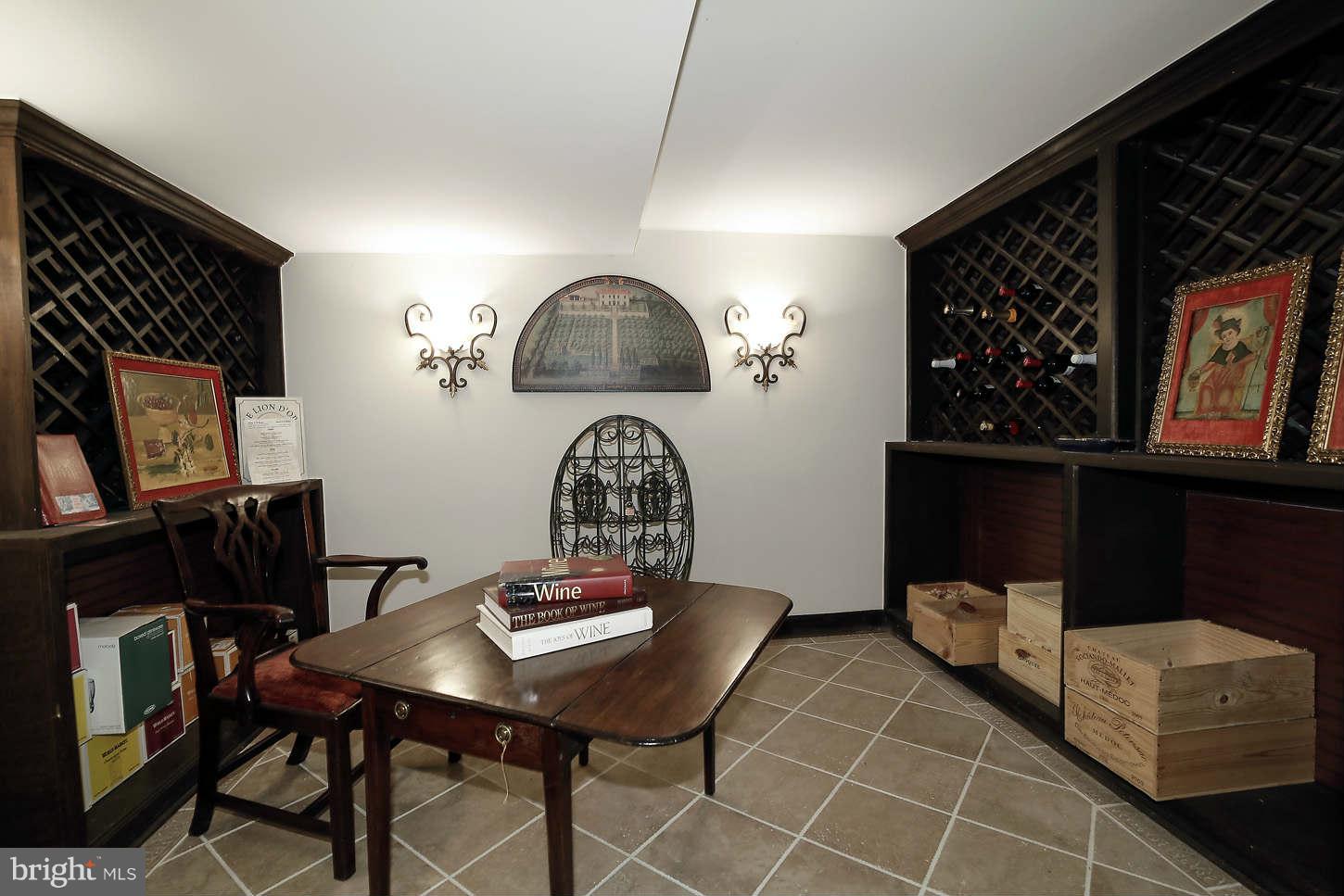 9311 River Road Potomac, MD 20854 - Photo 21 of 29 Wine storage and tasting room