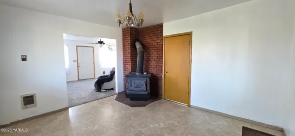 a view of a hallway with a chandelier