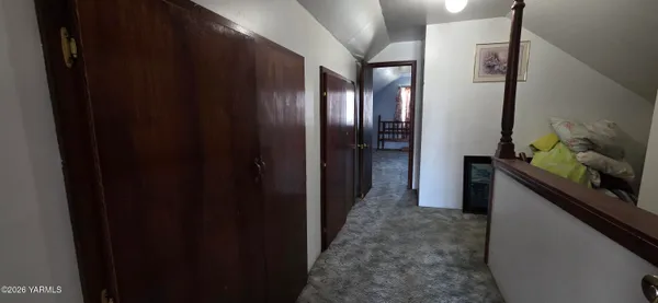a view of hallway with livingroom