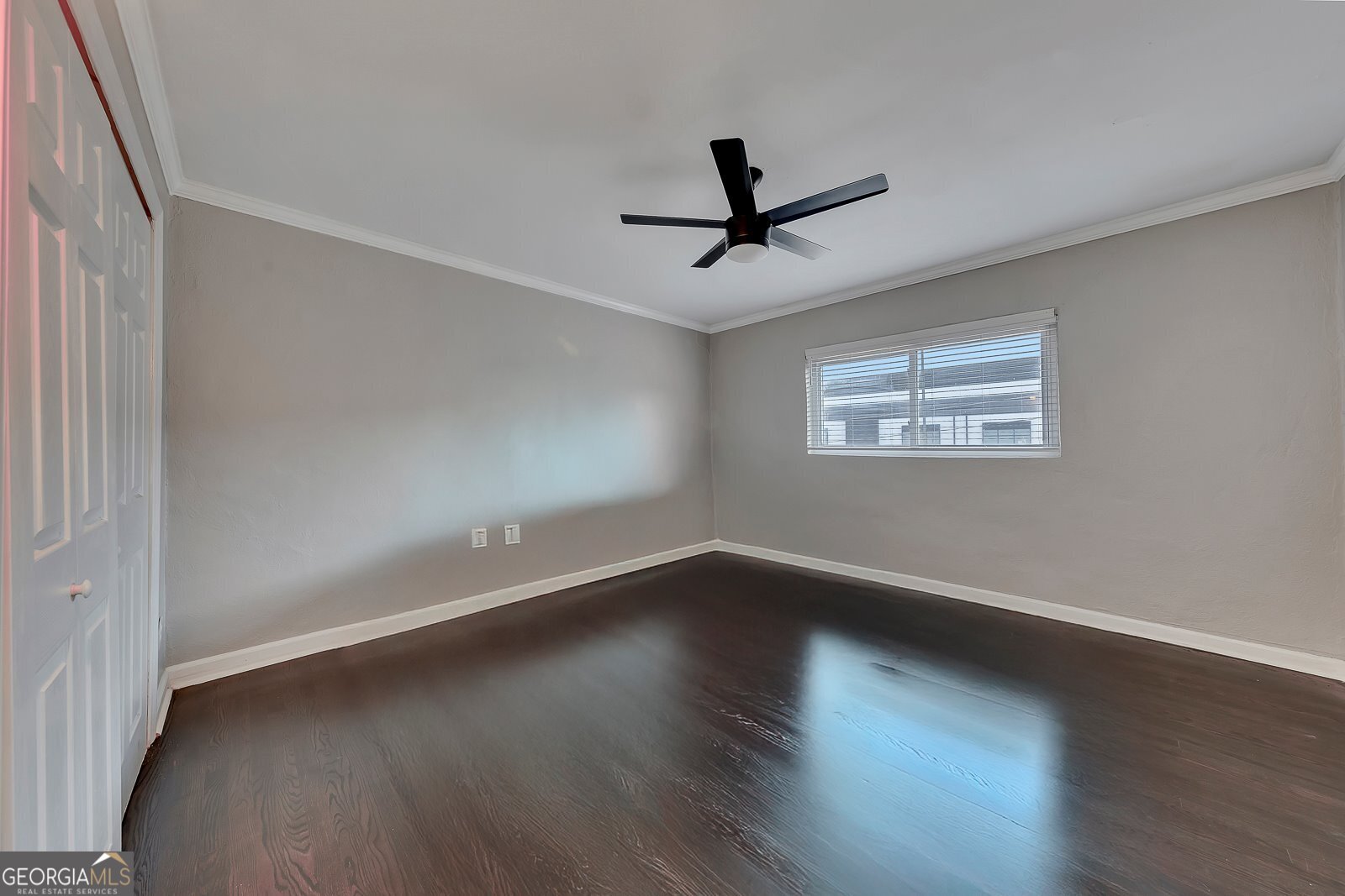1040 Herndon Street Northwest, Unit A Atlanta, GA 30318 - Photo 12 of 28 a view of a big room with wooden floor and windows