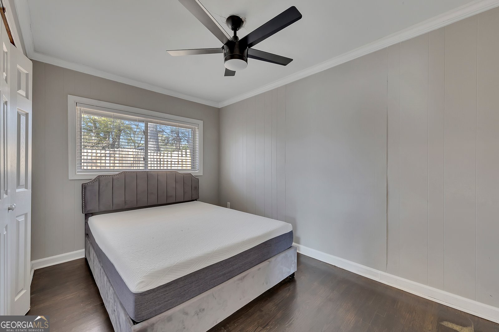 1040 Herndon Street Northwest, Unit A Atlanta, GA 30318 - Photo 17 of 28 a bedroom with a bed and a window