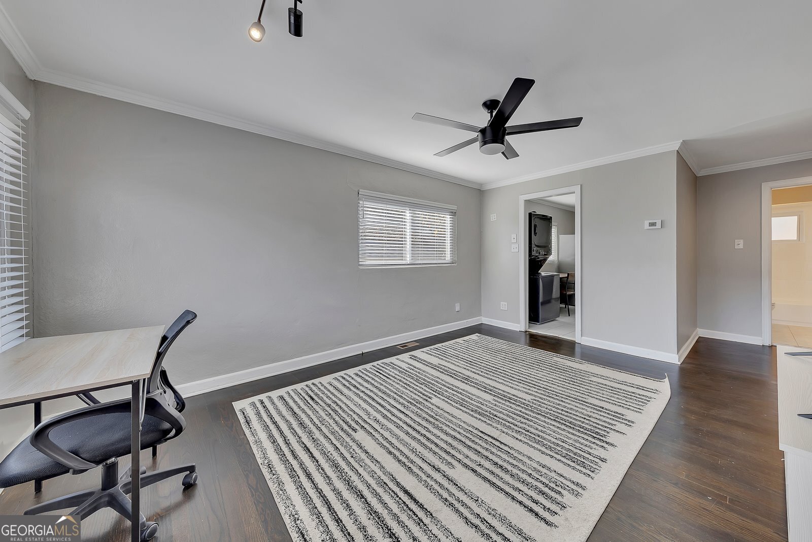 1040 Herndon Street Northwest, Unit A Atlanta, GA 30318 - Photo 4 of 28 a view of a livingroom with wooden floor and a ceiling fan