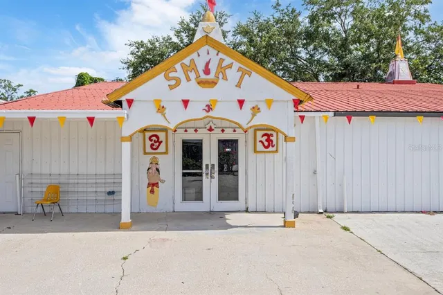 a view of a street with an outdoor space