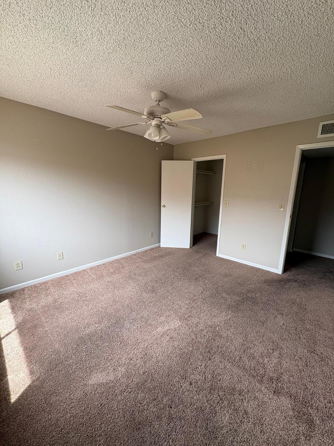 3511 East Baseline Road, Unit 1041 Phoenix, AZ 85042 - Photo 5 of 5 a view of a big room with carpet