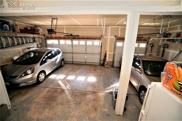 229 Avocet Loop Colorado Springs, CO 80921 - Photo 34 of 34 Interior of 3 car garage