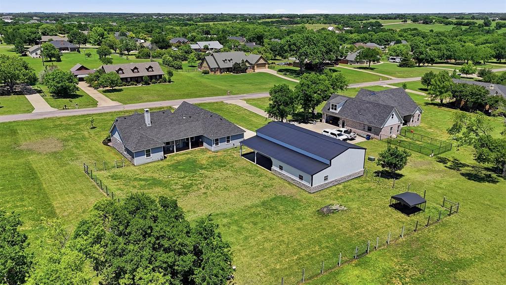 662 Preakness Place Road Van Alstyne, TX 75495 - Photo 37 of 39 an aerial view of a house with garden space and street view