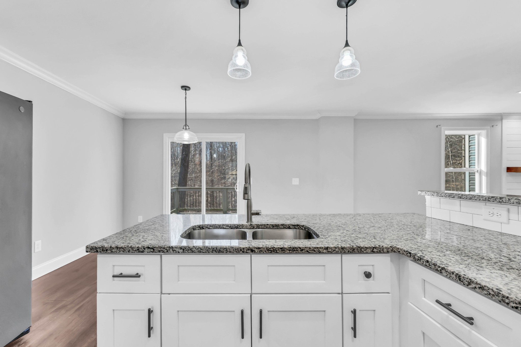 2320 Bearden Road Clarksville, TN 37043 - Photo 20 of 44 a kitchen with granite countertop white cabinets and a counter top space