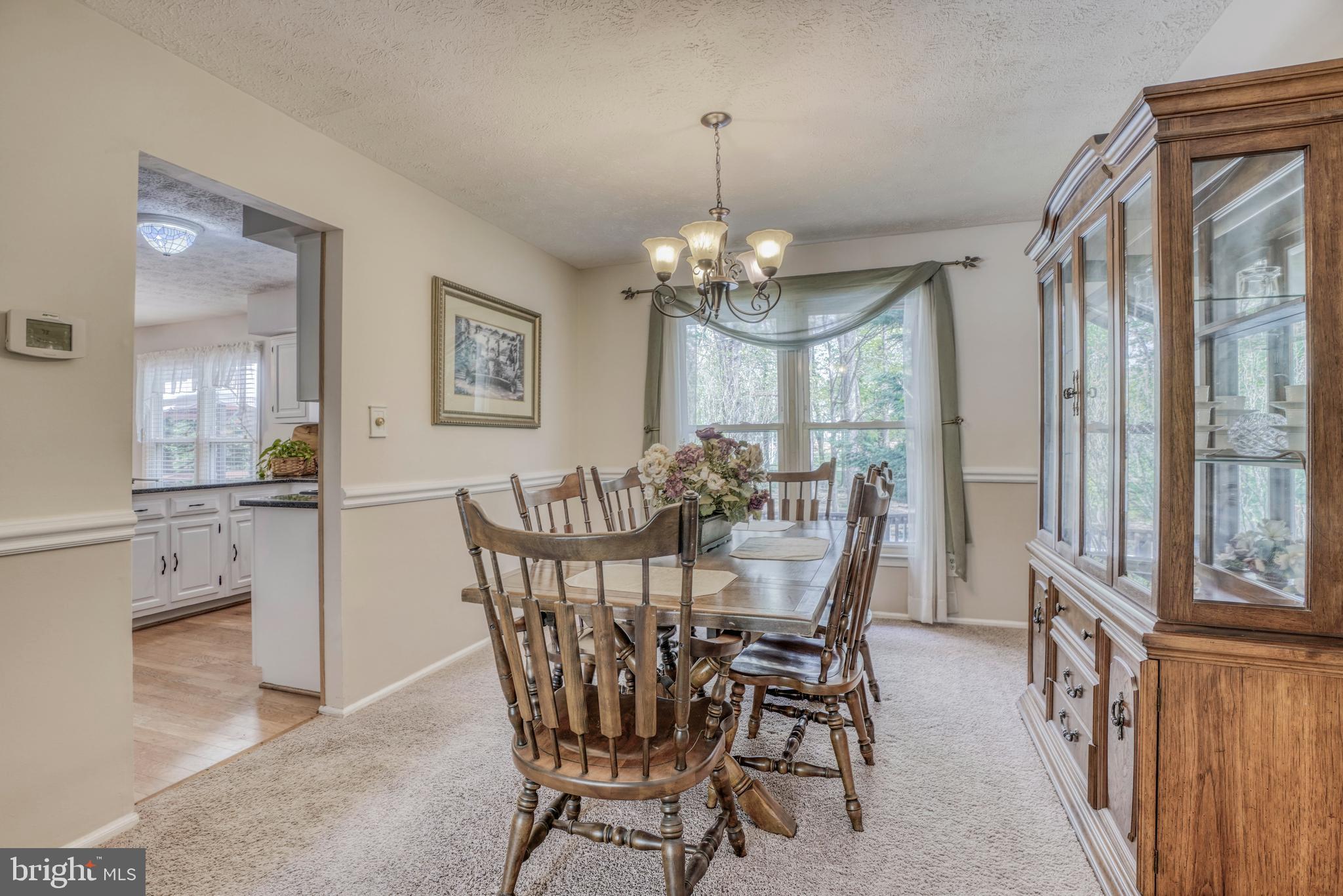 8619 Sherington Road Baltimore, MD 21236 - Photo 11 of 42 Dining room leads to kitchen