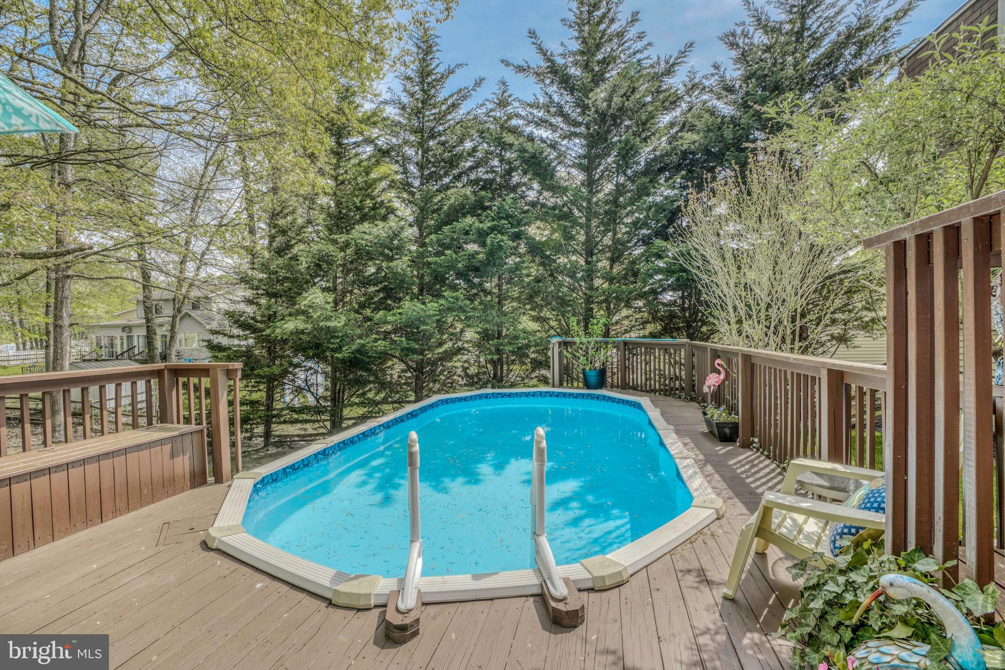 8619 Sherington Road Baltimore, MD 21236 - Photo 33 of 42 Above ground pool below deck