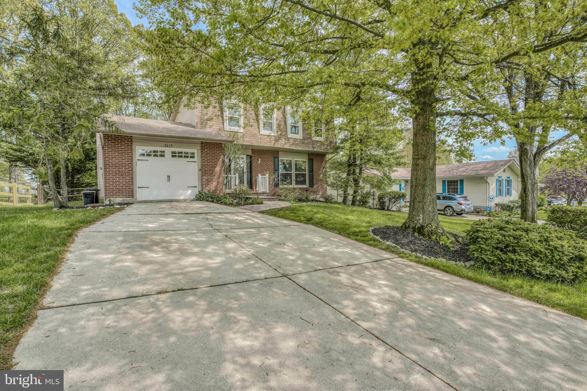 8619 Sherington Road Baltimore, MD 21236 - Photo 40 of 42 Large driveway with garage