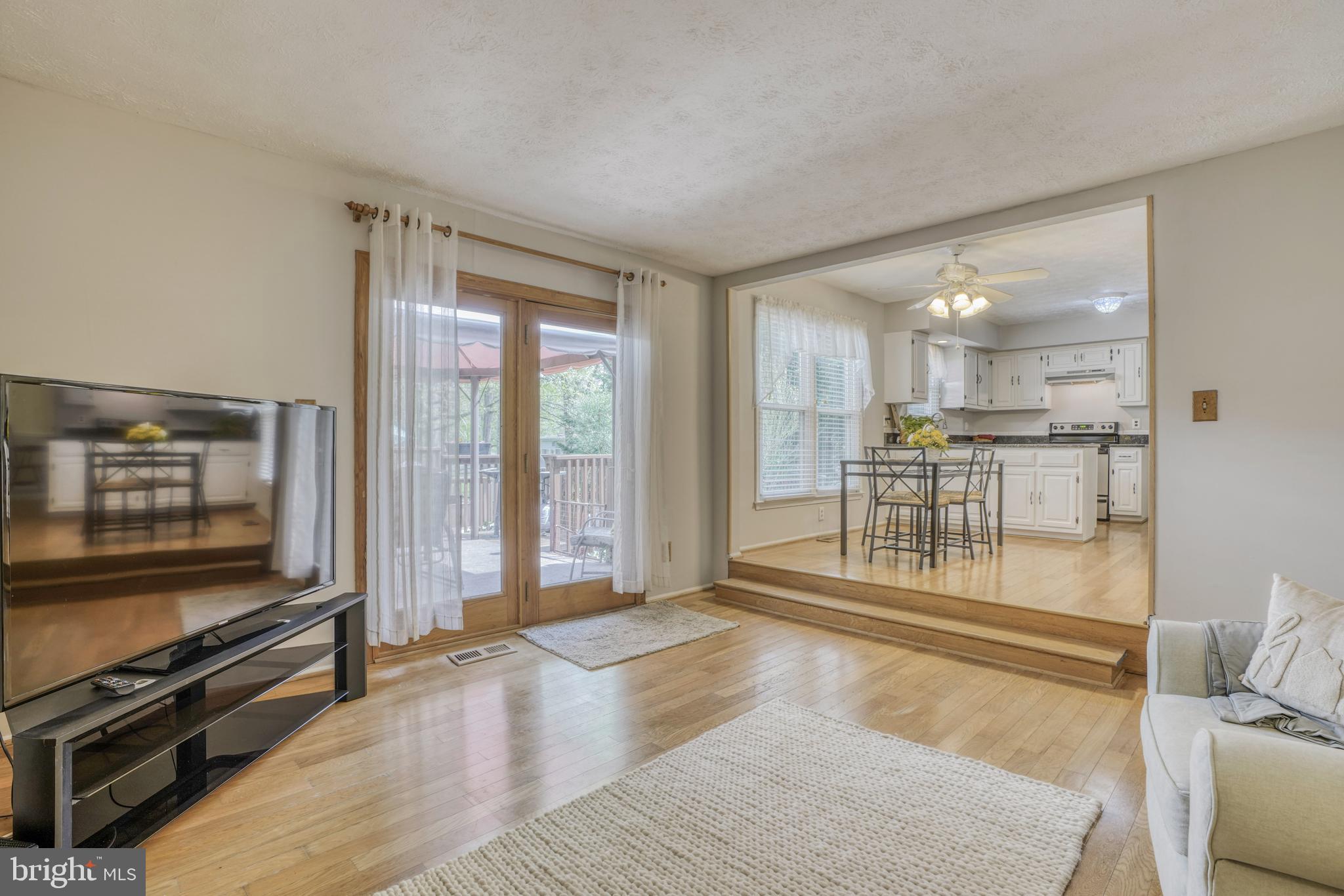 8619 Sherington Road Baltimore, MD 21236 - Photo 6 of 42 Family room has french doors leading to deck