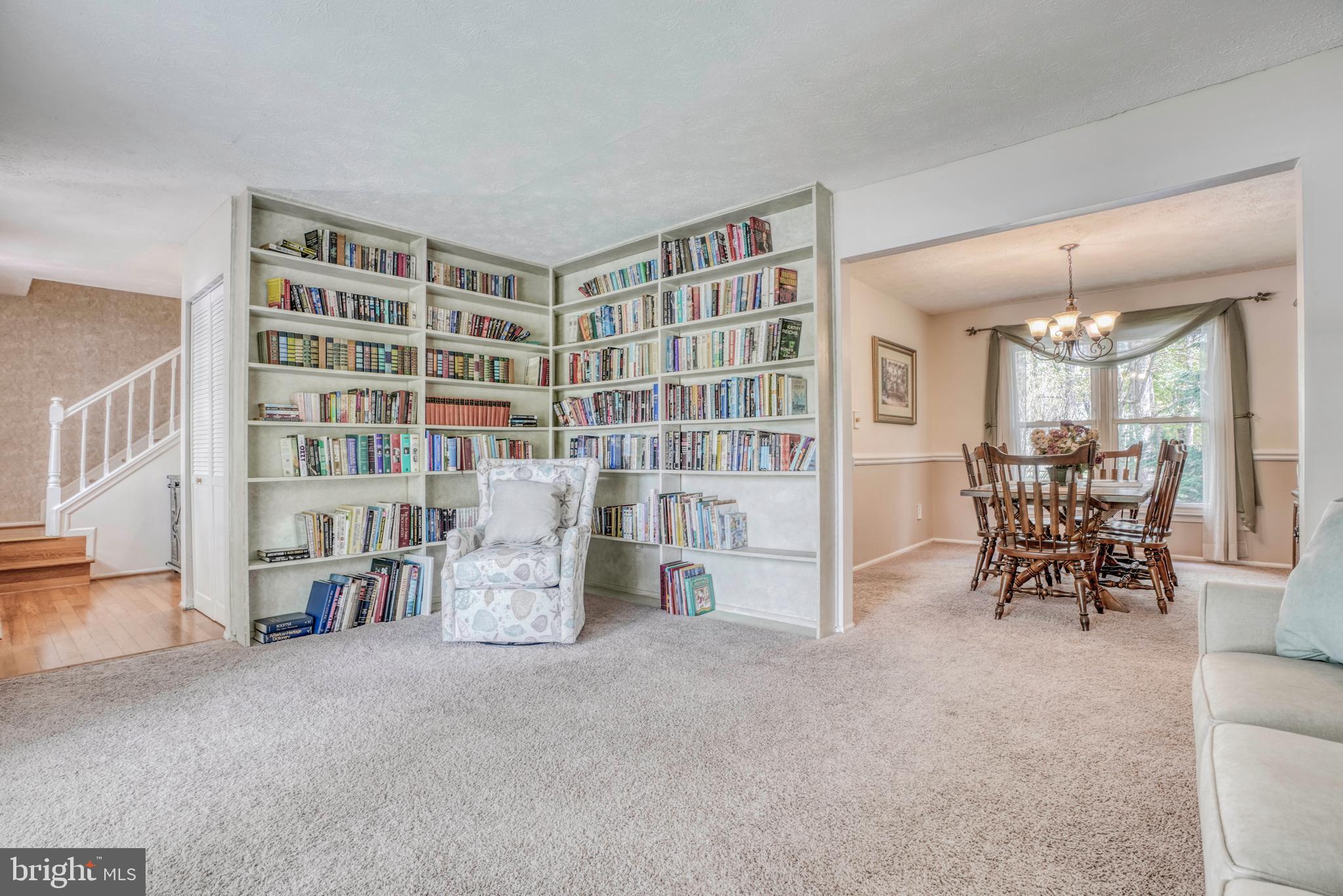 8619 Sherington Road Baltimore, MD 21236 - Photo 8 of 42 Living room w/ built in bookcases